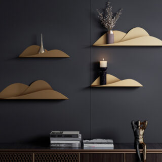 4 étagères murales dorées en forme de nuage sur un mur noir