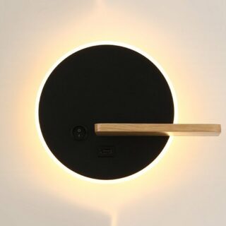 Photo d'une étagère murale ronde noire à LED avec une planche en bois