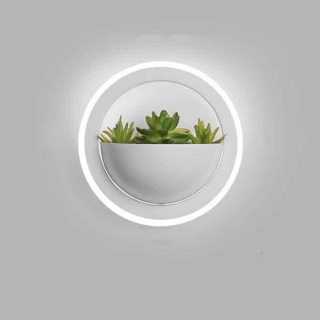 Une étagère murale pour plante applique à LED sur un fond gris