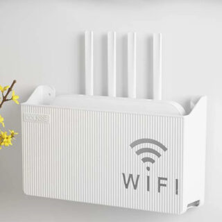 Étagère murale TV style boîte de rangement pour routeur wifi installée sur un mur blanc avec une fleur jaune à gauche